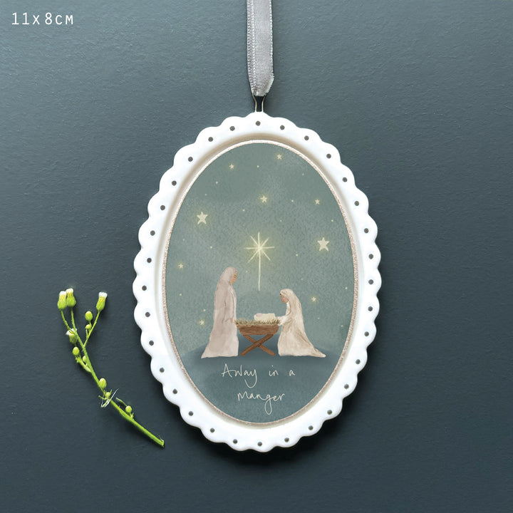 East of India Porcelain Scallop Oval Christmas Tree Decoration - Away in a Manger