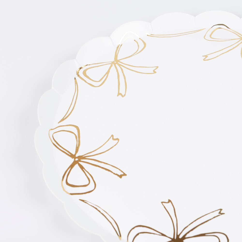Gold Bow Small Party Plates x 8 | Meri Meri Christmas Bows party plates Gold Bow Small Party Plates x 8
