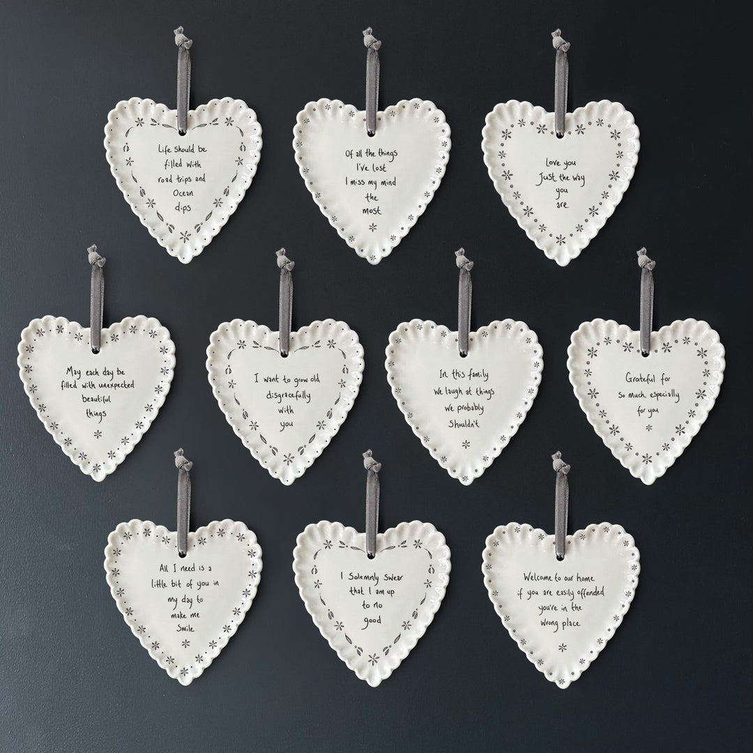 Porcelain Hanging Heart, Welcome to Offended Home | East of India Hanging Decoration East of India Porcelain Scallop Hanging Heart - Welcome to Offended Home