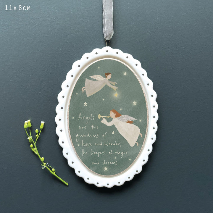 Porcelain Oval Angel Hanging Decoration | East of India Hanging Decoration East of India Porcelain Scallop Oval Hanging Decoration - Angels the Guardians Hopes &amp; Dreams